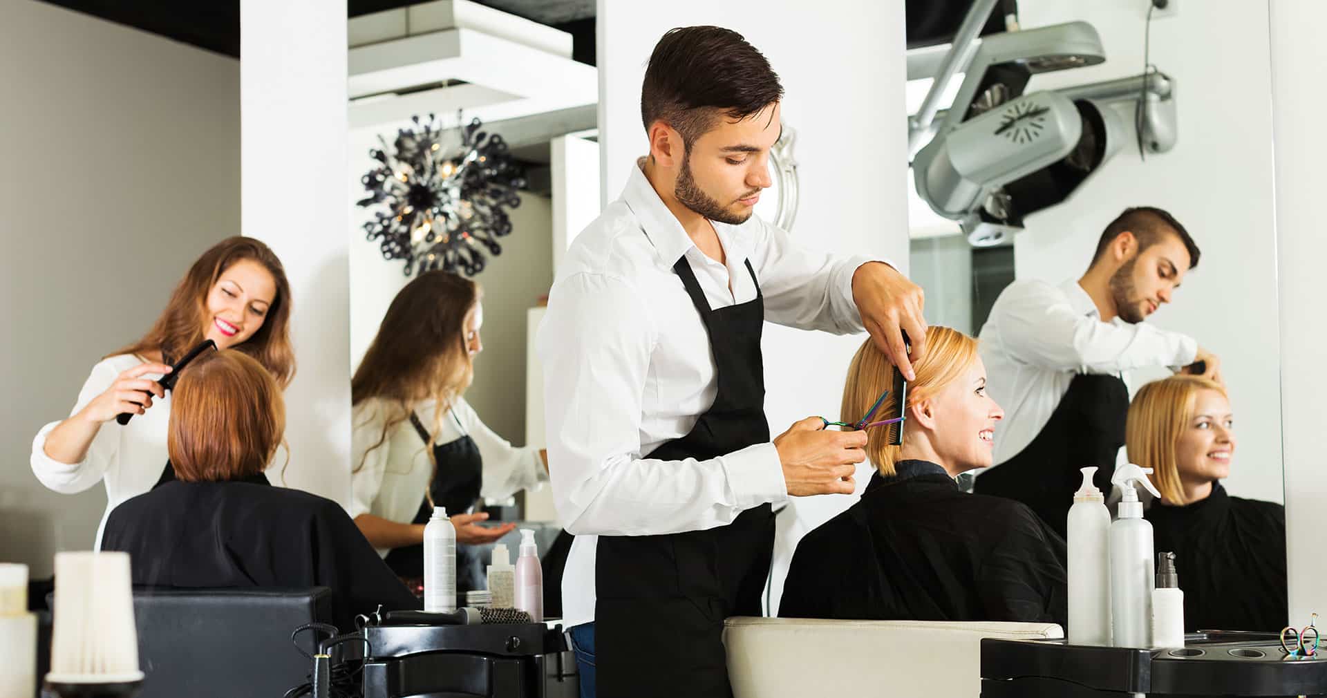Professional stylist working on a client's hair